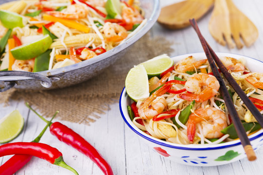 Healthy shrimp and vegetables stir-fry in a bowl, brightly lit