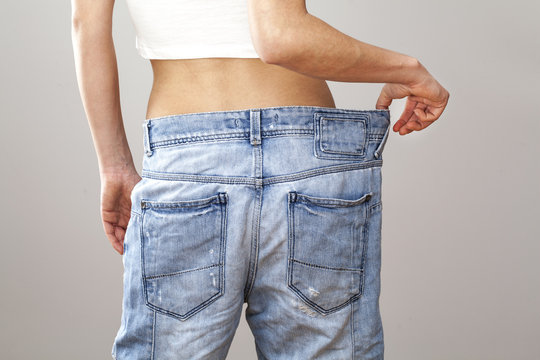 Weight loss woman with bluejeans