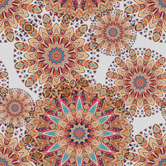 Watercolor ethnic ornate feathers abstract mandala seamless pattern.