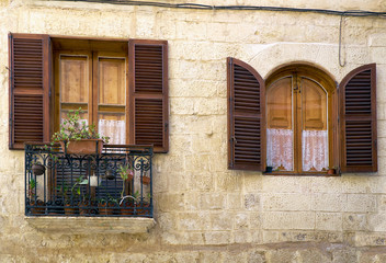 A view of traditional Maltese style balcony and window in Valletta. Malta.