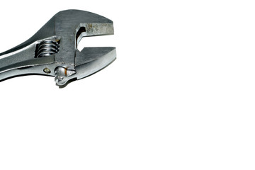 Adjustable wrench and nuts on white background