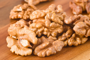 Walnuts on wooden board