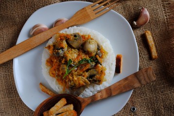 rice with mushrooms and steamed vegetables