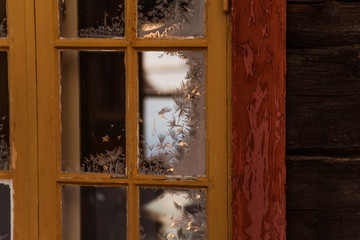 A beautiful window of an old wooden scandinavian house