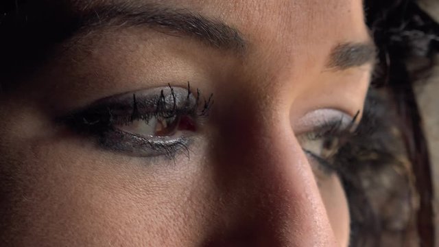 sad and thoughtful beautiful brown eyes of  woman