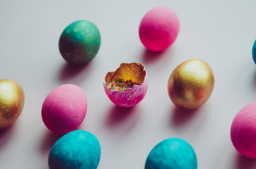 colorful easter eggs with confectionery sprinkling as pattern
