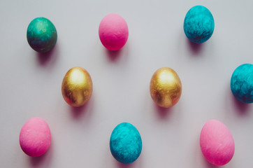 colorful easter eggs with confectionery sprinkling as pattern