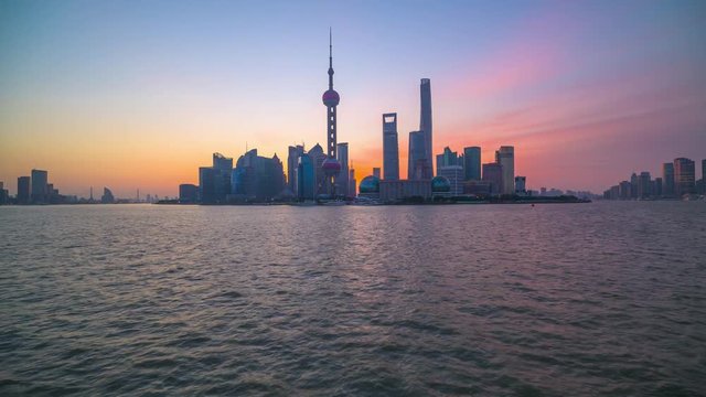 4K Timelapse of Shanghai Pudong viewed from the Bund Shanghai from Night to Day and Huangpu River in Shanghai, China