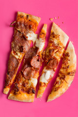 Overhead Shot of a Sliced Pepperoni Pizza