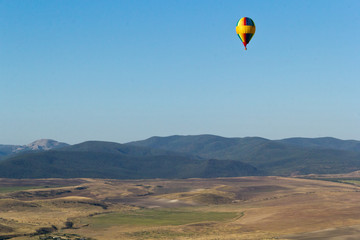Hot Air Balloon above the mountines