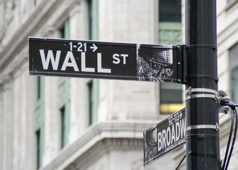 Wall street direction sign