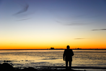 Man silhouette watching the skyline © Birgitta