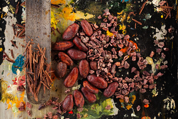 raw cacao nibs, shredded chocolate and cocoa beans