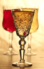 Glass and bottle wine on wooden table