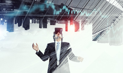 Fototapeta premium Man in virtual helmet . Mixed media