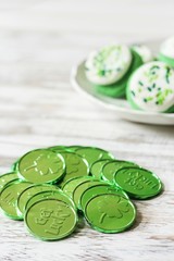 St Patrick Day Green Lucky coins with copy space, selective focus