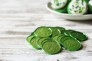 St Patrick Day Green Lucky coins with copy space, selective focus