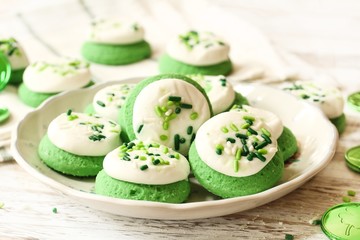St Patrick day Green  frosted  Cookies with sprinkles, selective focus