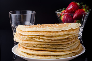 Home made pancakes on the luxury black background
