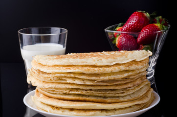 Home made pancakes on the luxury black background