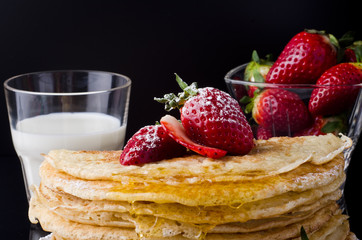 Home made pancakes on the luxury black background