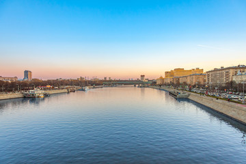 View of the Moskva river and embankments from the Crymsky bridge in autumn at sunset, Moscow landscape