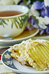 apple cheesecake with cup of tea sweet dessert still life