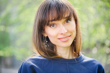 Fototapeta premium spring Sunny portrait of a beautiful woman