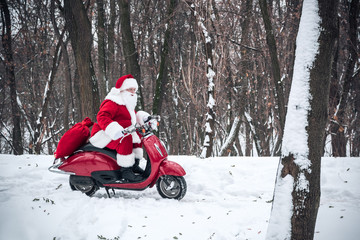 Santa Claus riding on scooter