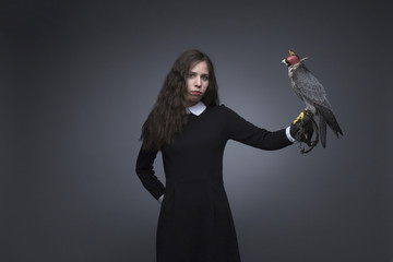 Girl and peregrine studio shooting