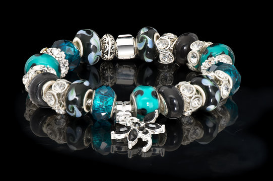 Fashion jewelry bangle beads background black