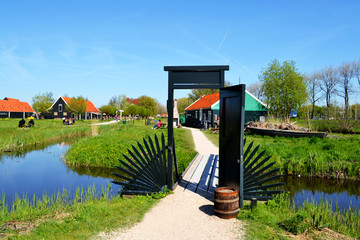 Dutch scenery with water canals in Zaanse Schans village