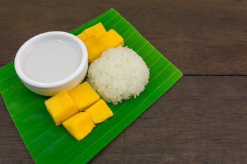 dessert sweet with sticky rice, mango and coconut cream