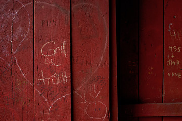 Close up of wooden wall graffiti