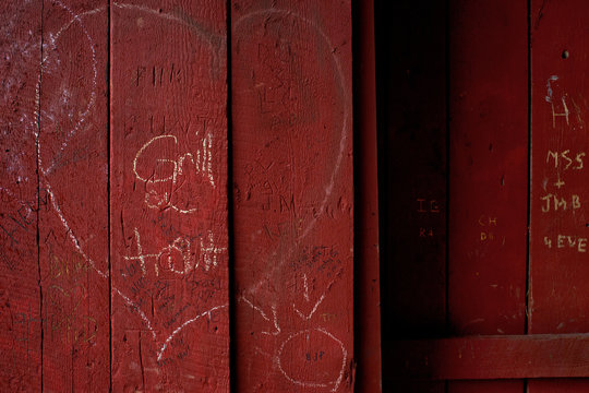 Close up of wooden wall graffiti