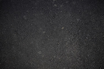 Black asphalt pattern. Top view