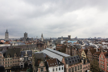 Architecture of streets of Ghent town, Belgium in rainy day in winter