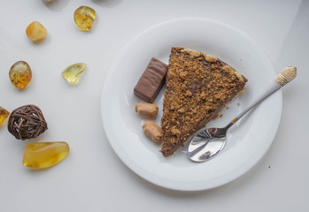 Homemade chocolate tart on a white plate
