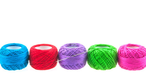 Yarn balls over white for background use