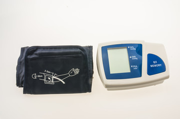 Home blood pressure monitor on white background