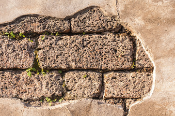 Old granite brick and cement wall texture for background use