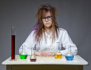 Serious shaggy scientist in lab