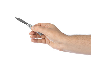 Hand with fish shaped knife