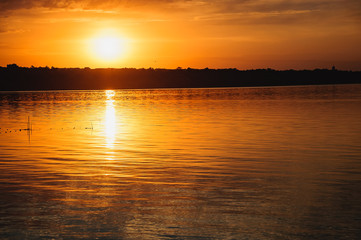 Beautiful sunset on the estuary, a reflection on the water