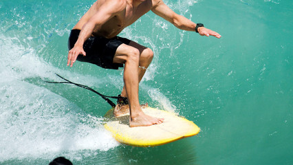 Surfing in tropical water