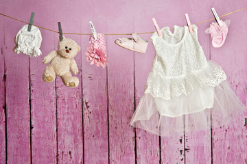 Baby clothes hanging on the clothesline