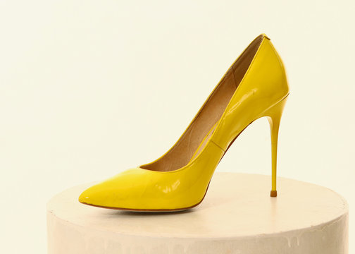 high heel yellow shoe