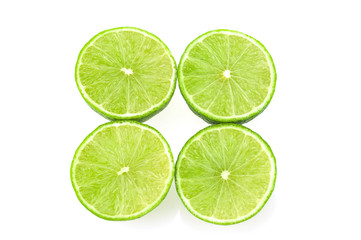 Fototapeta na wymiar Green lemon isolated over white