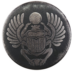 Scarabaeus carved in silver coin isolated on white background