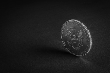 One US dollar coin silver - business concept, background